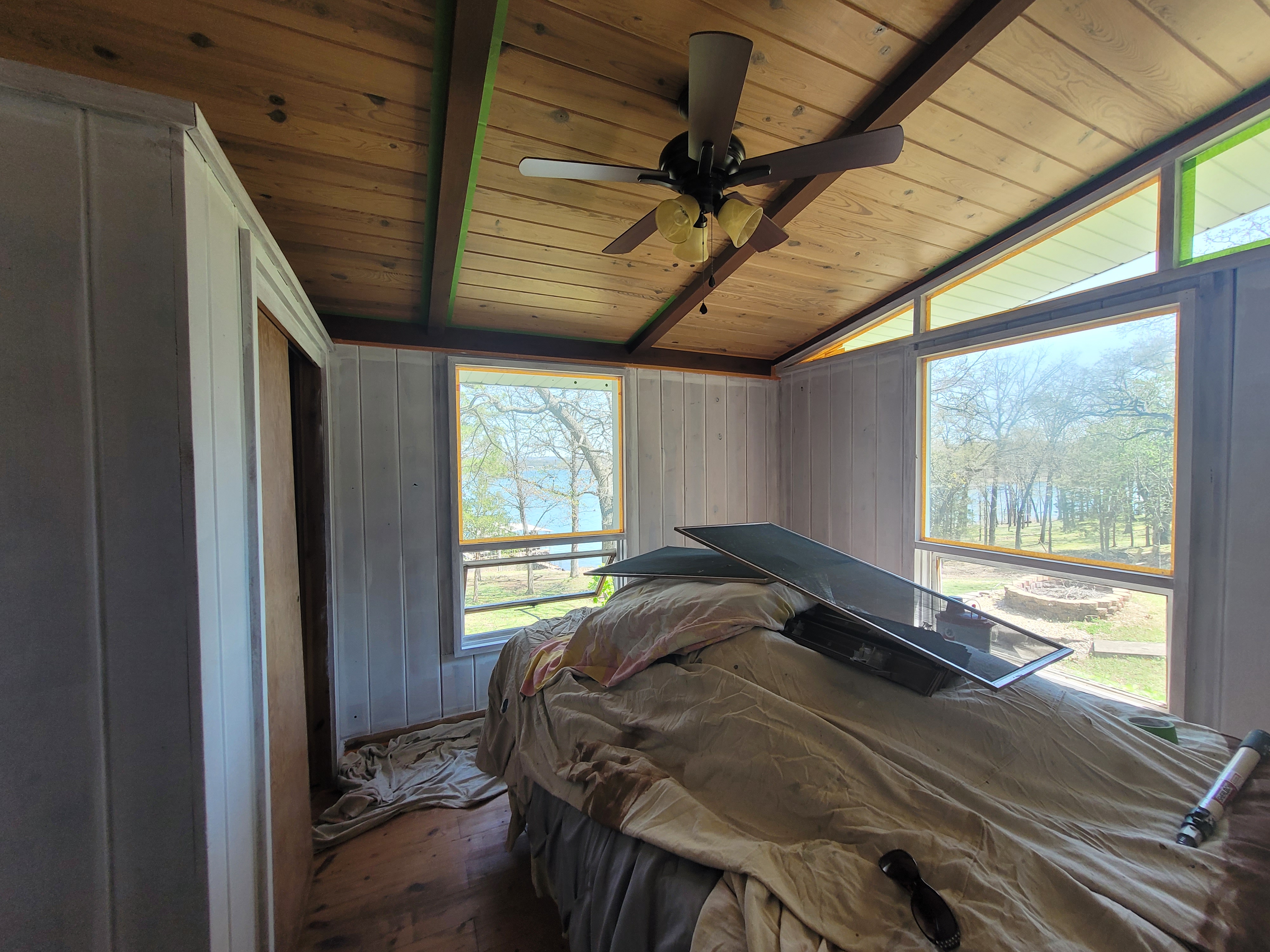 Painted lake cabin bedroom after refresh