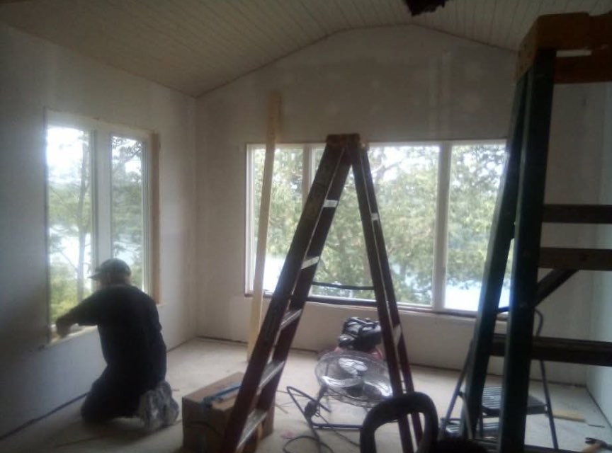 Dining addition during construction — windows and trim going in